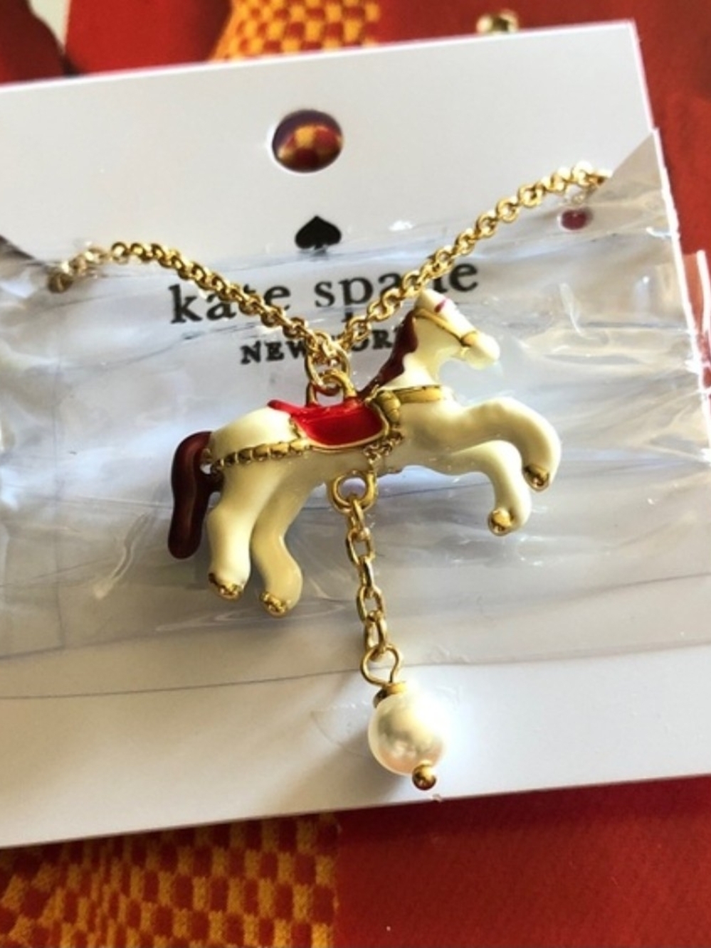 kate spade Gold-Plated Carousel Horse Necklace with Pink and White Enamel - Picture 4 of 4